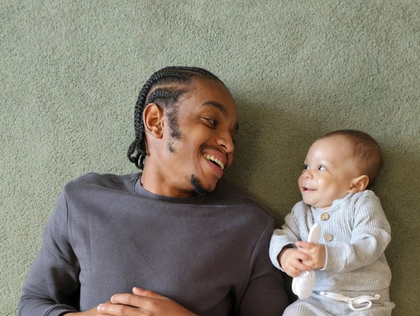 a person holding a baby